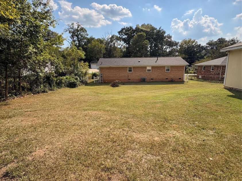 204 Nims Road, Mount Holly, NC 28120.  MLS# CAR4426810, YatesRealty ID 52380. Backyard