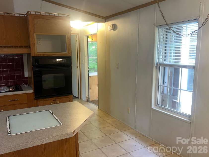 5543 White Oaks Drive, Morganton, NC 28655.  MLS# CAR4426777, YatesRealty ID 52381. 