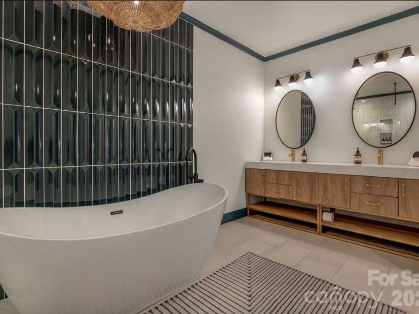 58 Bird Creek Estates Road, Black Mountain, NC 28711.  MLS# CAR4427379, YatesRealty ID 52383. Lower Level Suite Bathroom