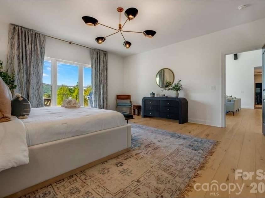 58 Bird Creek Estates Road, Black Mountain, NC 28711.  MLS# CAR4427379, YatesRealty ID 52383. Main Level Bedroom Suite