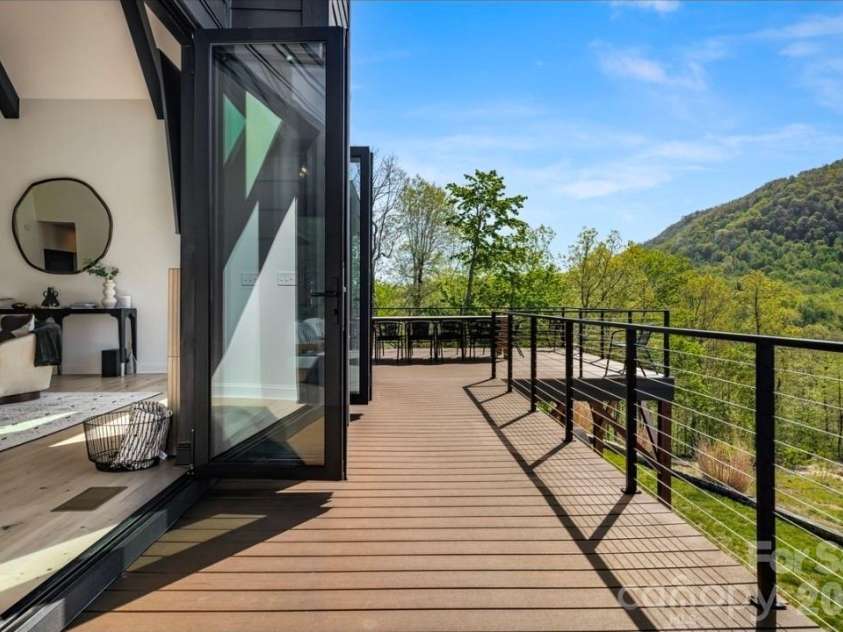 58 Bird Creek Estates Road, Black Mountain, NC 28711.  MLS# CAR4427379, YatesRealty ID 52383. Main Level Deck Access