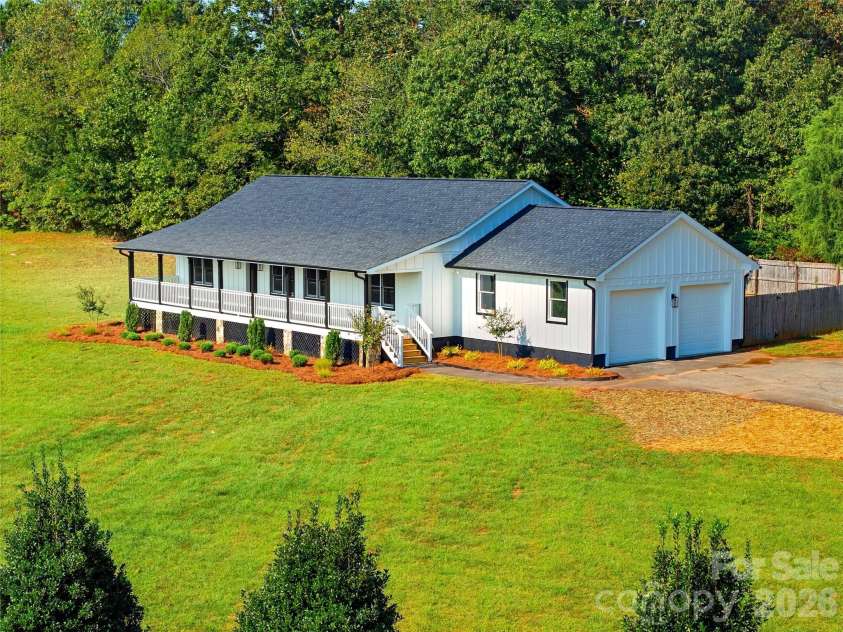 170 Countrytyme Lane, Iron Station, NC 28080.  MLS# CAR4426755, YatesRealty ID 52390. Front with Garage