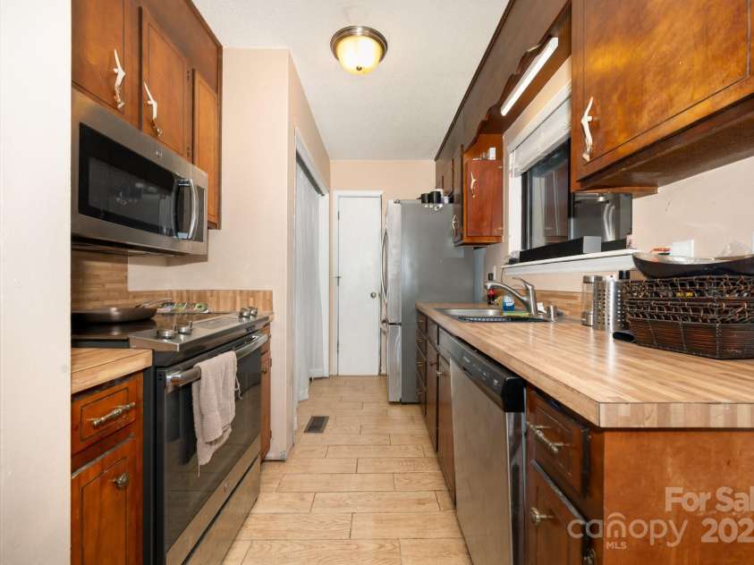 6013 Tall Tree Lane, Harrisburg, NC 28075.  MLS# CAR4316032, YatesRealty ID 524. 