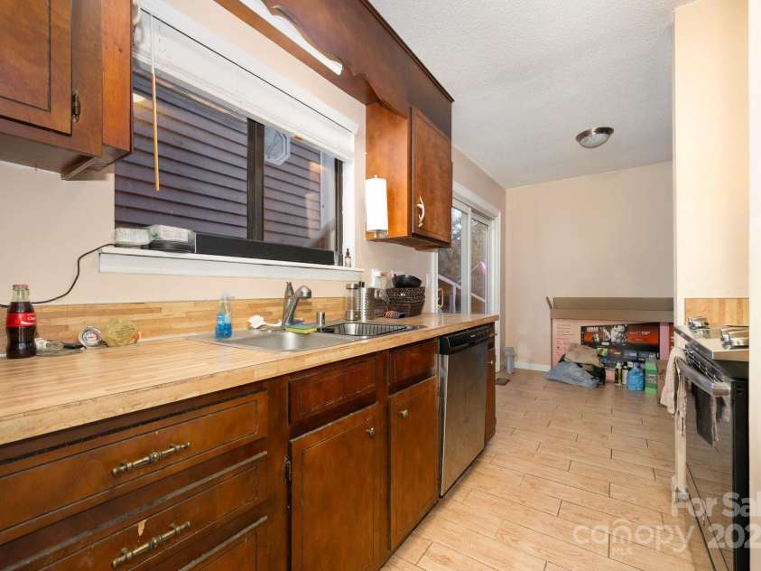 6013 Tall Tree Lane, Harrisburg, NC 28075.  MLS# CAR4316032, YatesRealty ID 524. 