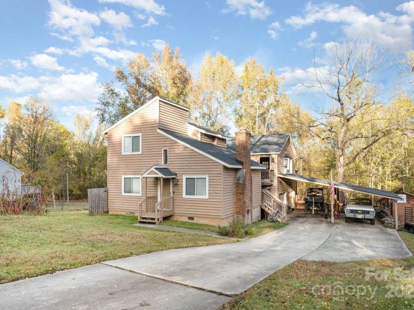 6013 Tall Tree Lane, Harrisburg, NC 28075.  MLS# CAR4316032, YatesRealty ID 524. 