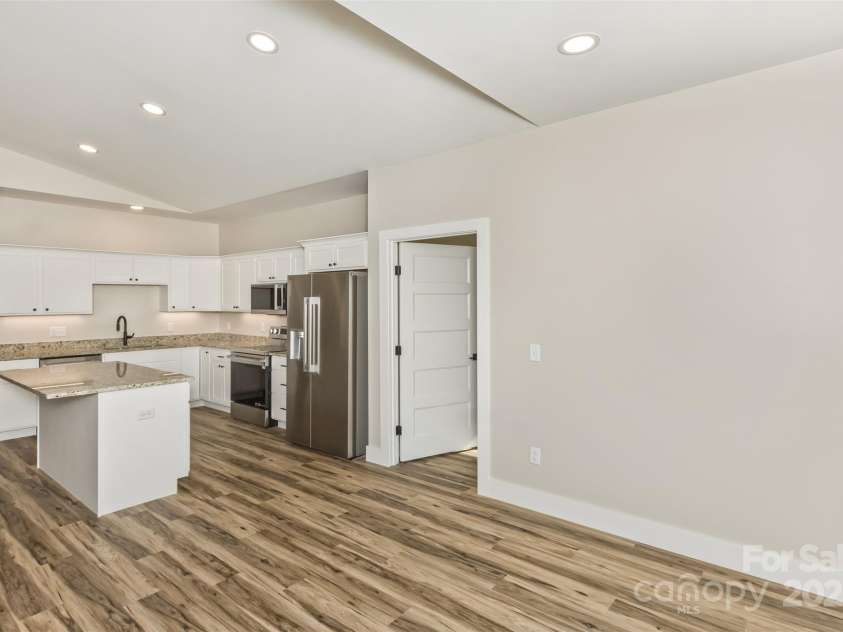 115 Peyton Elaine Road, Clyde, NC 28721.  MLS# CAR4329070, YatesRealty ID 52403. Kitchen looking from dining area