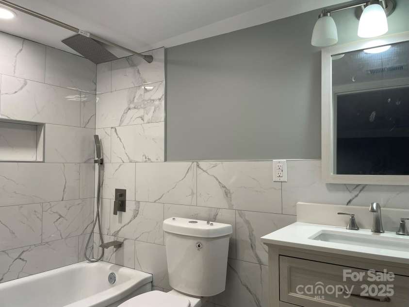 108 Evans Street, Morganton, NC 28655.  MLS# CAR4221217, YatesRealty ID 5241. Upper level bathroom