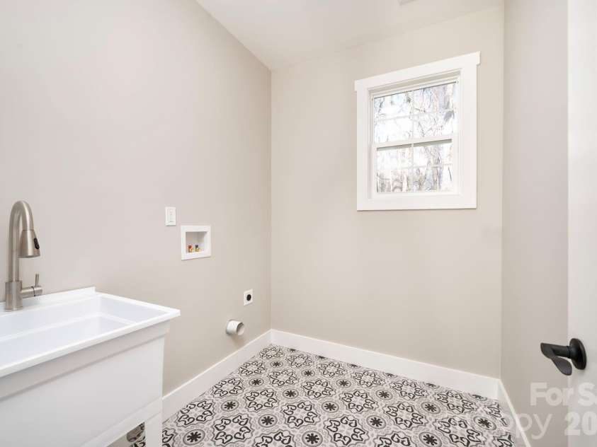 9 Myrtle Lee Cove, Arden, NC 28704.  MLS# CAR4355602, YatesRealty ID 5241. Main Level Laundry Room