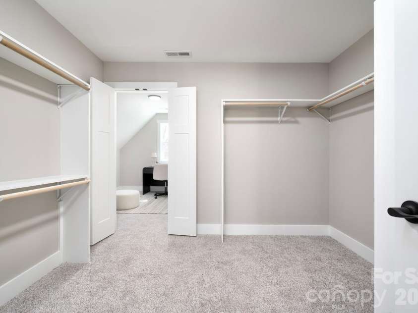 9 Myrtle Lee Cove, Arden, NC 28704.  MLS# CAR4355602, YatesRealty ID 5241. Oversized Primary Closet with Flex Room Access