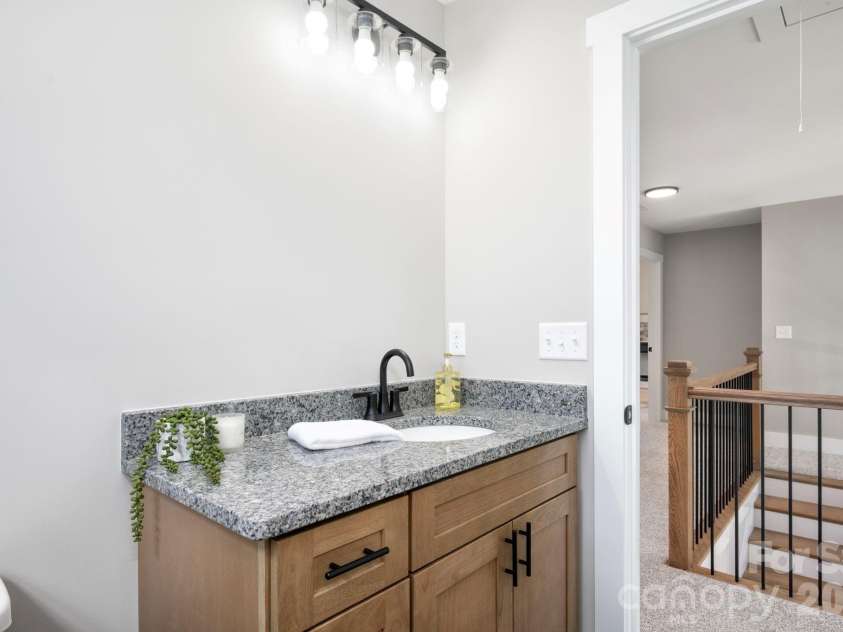 9 Myrtle Lee Cove, Arden, NC 28704.  MLS# CAR4355602, YatesRealty ID 5241. Shared Full Upstairs Bathroom