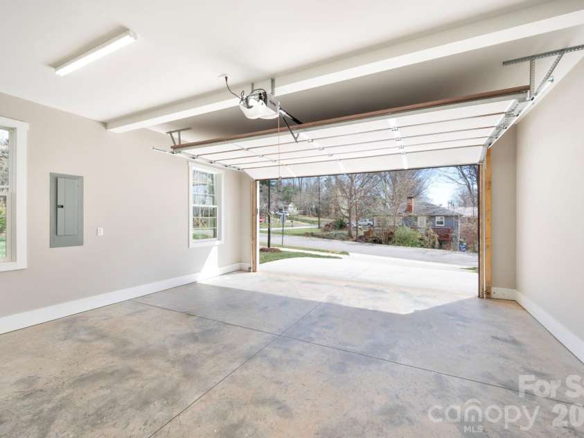 9 Myrtle Lee Cove, Arden, NC 28704.  MLS# CAR4355602, YatesRealty ID 5241. Spacious 2-Car Garage