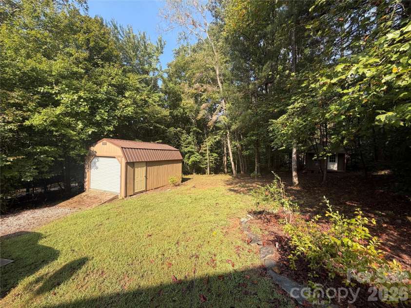 411 Cabin Cove Lane, Moravian Falls, NC 28654.  MLS# CAR4427462, YatesRealty ID 52415. 
