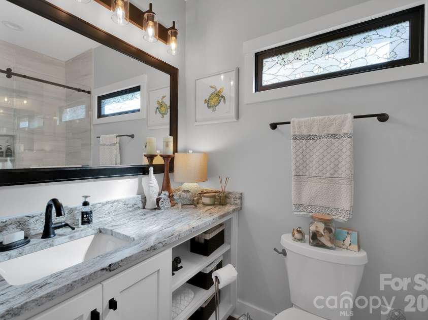 4111 Ridge Road, Conover, NC 28613.  MLS# CAR4317539, YatesRealty ID 5243. First floor full guest bathroom 