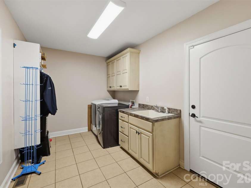 1163 Willow Creek Drive, Newton, NC 28658.  MLS# CAR4427436, YatesRealty ID 52432. Main level laundry