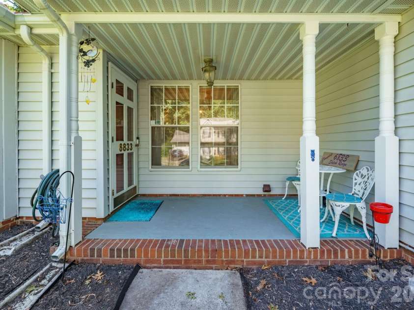 6833 Shiloh Ridge Lane, Charlotte, NC 28212.  MLS# CAR4426725, YatesRealty ID 52433. Covered Porch