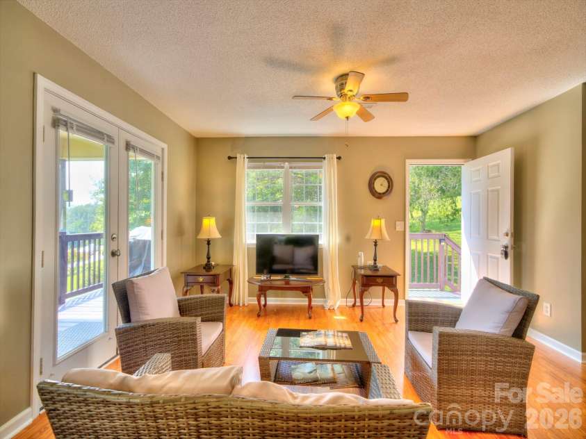 38 Country Lane, Franklin, NC 28734.  MLS# CAR4417927, YatesRealty ID 52434. Living Room View from Dining Area