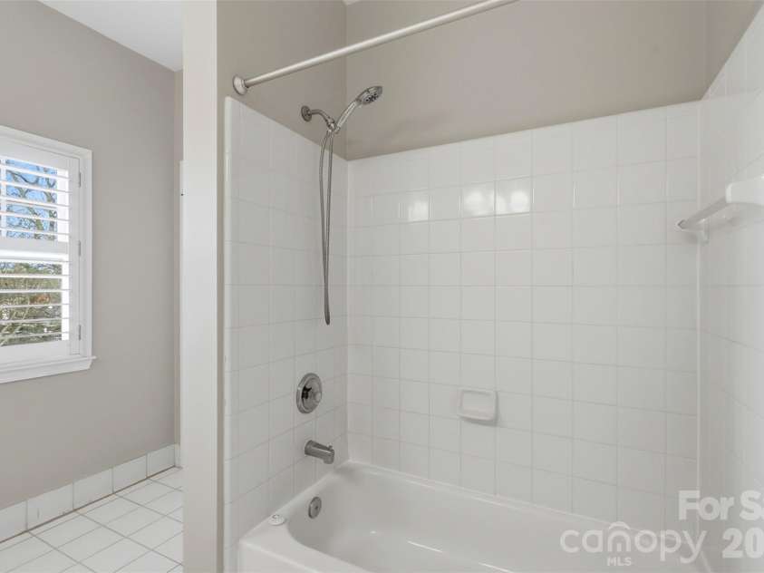 400 Clarice Avenue, Charlotte, NC 28204.  MLS# CAR4356647, YatesRealty ID 5244. Shower is clean and serves as is or ready for future updates.