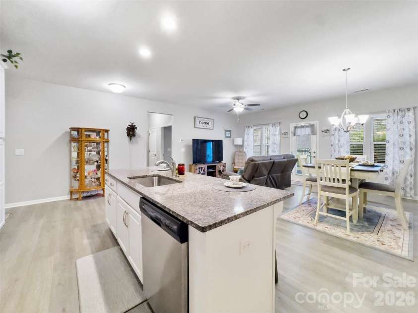 60119 Blue Bird Lane, Lancaster, SC 29720.  MLS# CAR4426158, YatesRealty ID 52441. Kitchen Island with sink and granite counter top