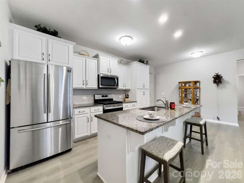 60119 Blue Bird Lane, Lancaster, SC 29720.  MLS# CAR4426158, YatesRealty ID 52441. Kitchen with SS refrigerator, gas stove