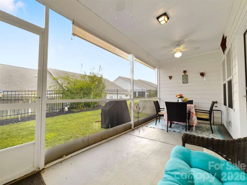 60119 Blue Bird Lane, Lancaster, SC 29720.  MLS# CAR4426158, YatesRealty ID 52441. Screened porch with screen shades