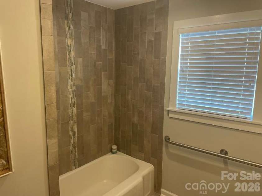 1670 Dale Earnhardt Boulevard, Kannapolis, NC 28083.  MLS# CAR4427144, YatesRealty ID 52443. Hall Bathroom - shower