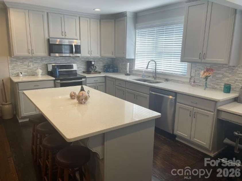 1670 Dale Earnhardt Boulevard, Kannapolis, NC 28083.  MLS# CAR4427144, YatesRealty ID 52443. Kitchen Island - 4 stools included