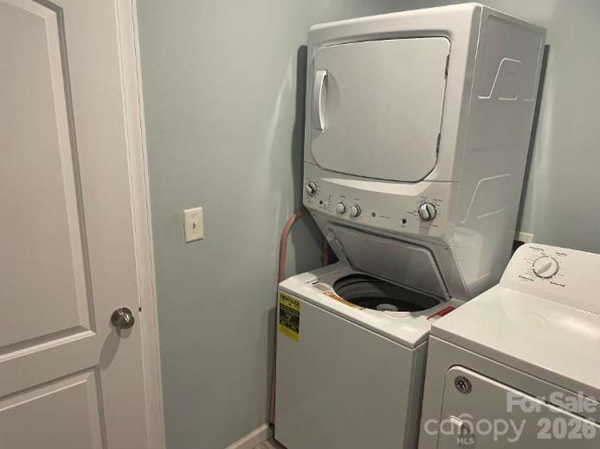 1670 Dale Earnhardt Boulevard, Kannapolis, NC 28083.  MLS# CAR4427144, YatesRealty ID 52443. Stackable washer/dryer located in Primary Closet and included with house.