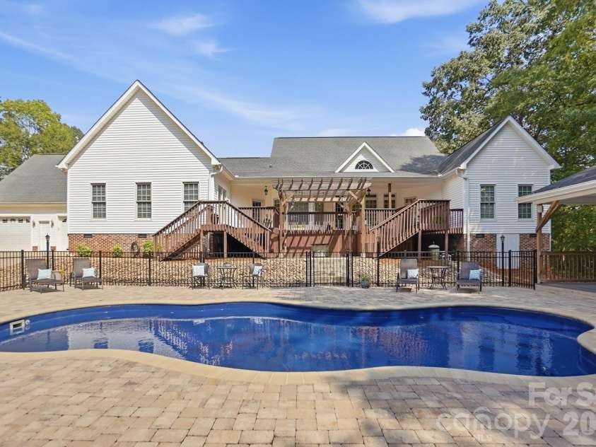 5881 Highway 557 Highway, Lake Wylie, SC 29710.  MLS# CAR4426749, YatesRealty ID 52449. Saltwater pool with stone paver surround decking.