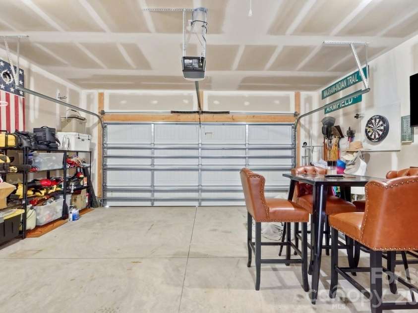 5112 Natural Path Lane, Waxhaw, NC 28173.  MLS# CAR4426658, YatesRealty ID 52452. Garage slash man cave
