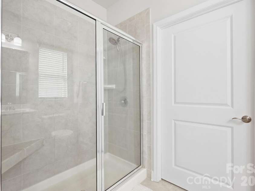 5112 Natural Path Lane, Waxhaw, NC 28173.  MLS# CAR4426658, YatesRealty ID 52452. Primary shower