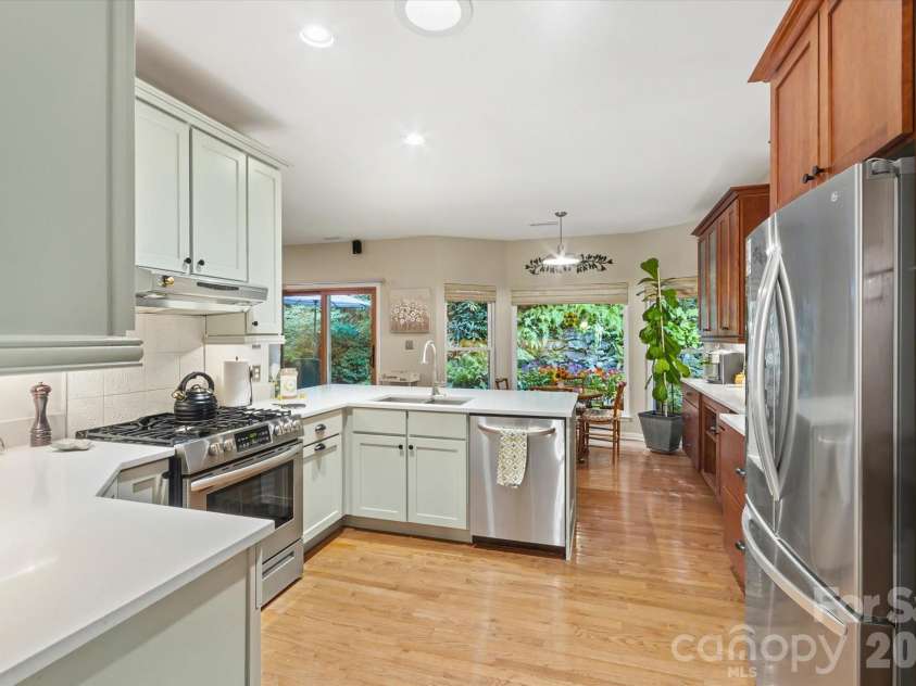 300 Caroline Lane, Pisgah Forest, NC 28768.  MLS# CAR4426646, YatesRealty ID 52453. Beautiful custom kitchen with gas range