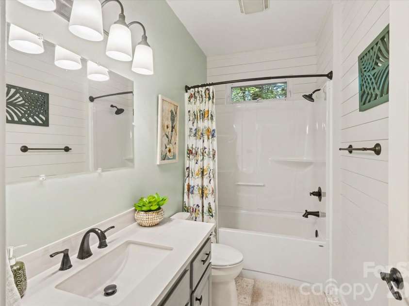 300 Caroline Lane, Pisgah Forest, NC 28768.  MLS# CAR4426646, YatesRealty ID 52453. Guest bathroom