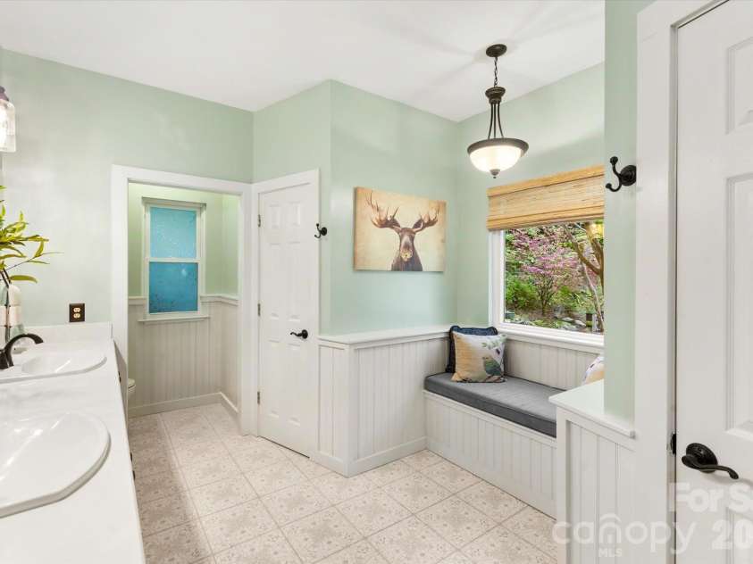 300 Caroline Lane, Pisgah Forest, NC 28768.  MLS# CAR4426646, YatesRealty ID 52453. Primary Ensuite with double vanity