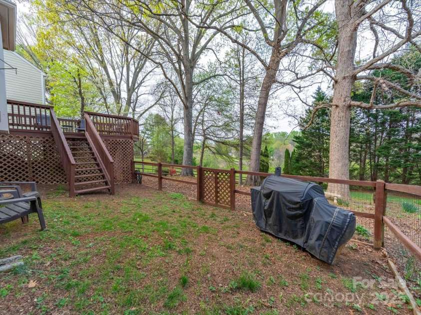 12708 Hollyhock Lane, Huntersville, NC 28078.  MLS# CAR4241322, YatesRealty ID 5246. Small area of backyard is fenced