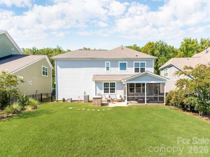 12110 Westbranch Parkway, Davidson, NC 28036.  MLS# CAR4423144, YatesRealty ID 52469. Large level backyard.