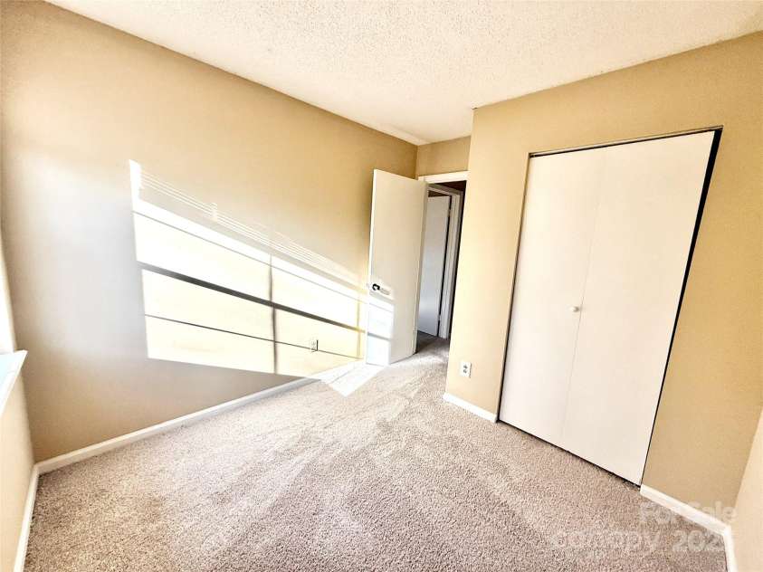 3959 Briarhill Drive, Charlotte, NC 28215.  MLS# CAR4214956, YatesRealty ID 5247. Primary bedroom