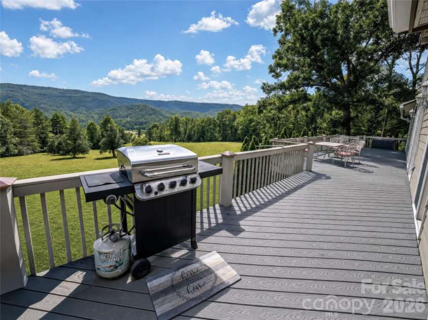 15809 US 221 None, Marion, NC 28752.  MLS# CAR4418221, YatesRealty ID 52475. Back deck looking over majestic views