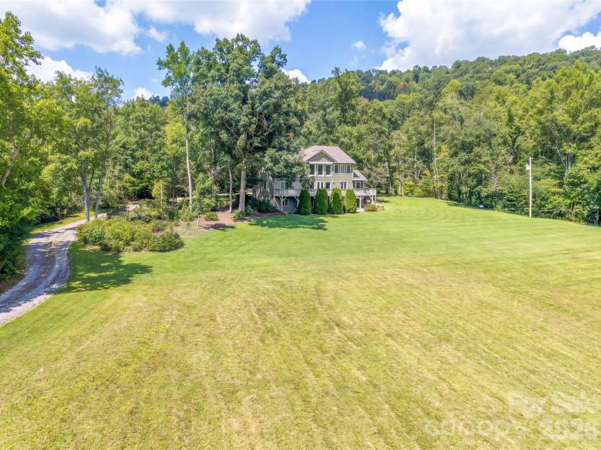 15809 US 221 None, Marion, NC 28752.  MLS# CAR4418221, YatesRealty ID 52475. Home sits on 25.33 acres