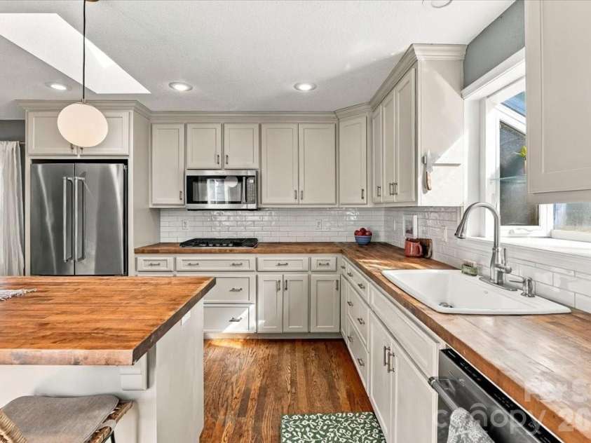94 Pressley Avenue, Brevard, NC 28712.  MLS# CAR4418924, YatesRealty ID 52476. 