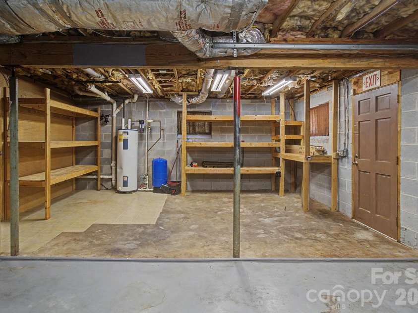 21 Coffey Circle, Asheville, NC 28806.  MLS# CAR4424466, YatesRealty ID 52488. Storage/ potential workshop area