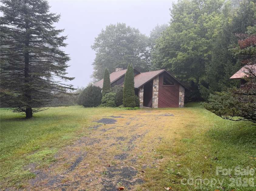697 Grassy Mountain Road, Little Switzerland, NC 28749.  MLS# CAR4427635, YatesRealty ID 52492. 