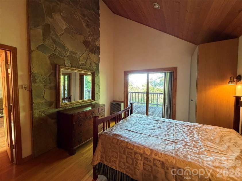 697 Grassy Mountain Road, Little Switzerland, NC 28749.  MLS# CAR4427635, YatesRealty ID 52492. Primary Bedroom