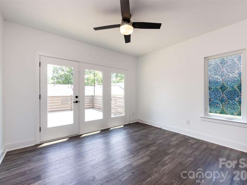 232 Flint Street, Charlotte, NC 28216.  MLS# CAR4425709, YatesRealty ID 52507. Bedroom 1 on the first floor
