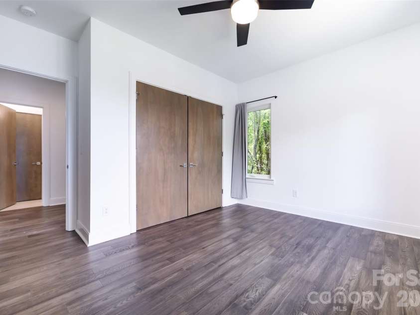 232 Flint Street, Charlotte, NC 28216.  MLS# CAR4425709, YatesRealty ID 52507. Bedroom 2 on 2nd level