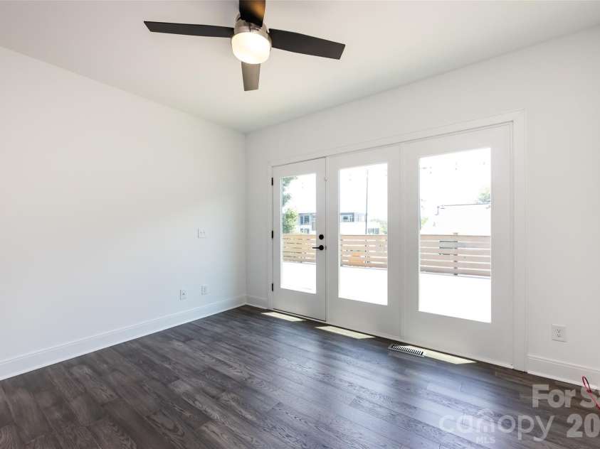 232 Flint Street, Charlotte, NC 28216.  MLS# CAR4425709, YatesRealty ID 52507. Bedroom first floor with full bath in hallway