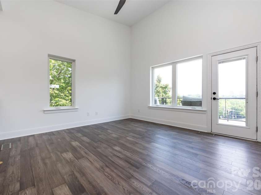 232 Flint Street, Charlotte, NC 28216.  MLS# CAR4425709, YatesRealty ID 52507. Living Room 3rd floor