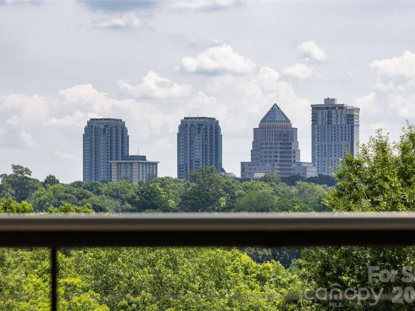 232 Flint Street, Charlotte, NC 28216.  MLS# CAR4425709, YatesRealty ID 52507. View from deck uptown Charlotte