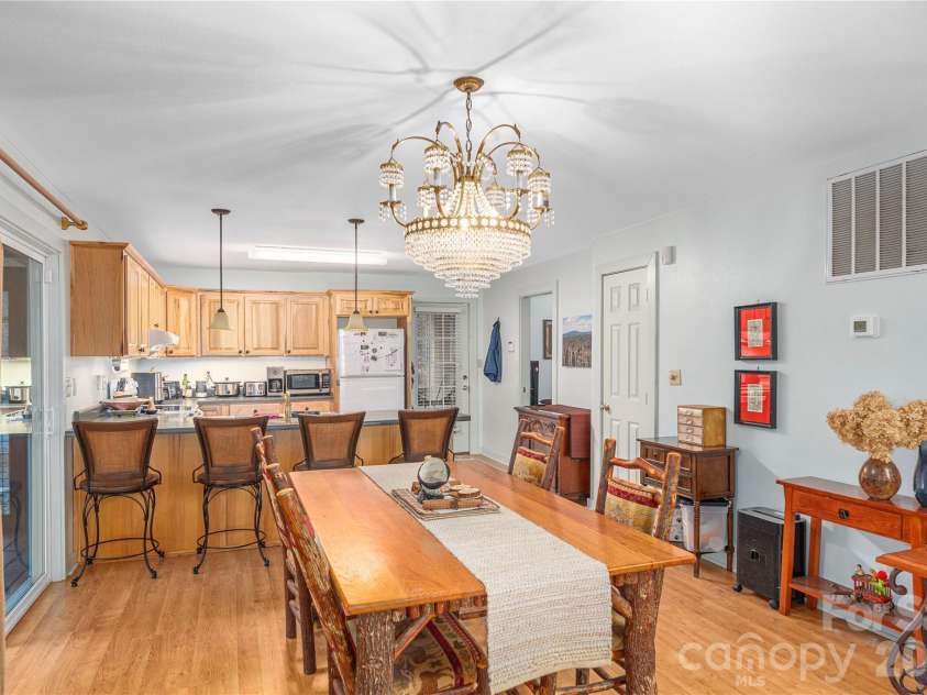 12 Bear Cove Lane, Bryson City, NC 28713.  MLS# CAR4337192, YatesRealty ID 5251. Dining area and kitchen