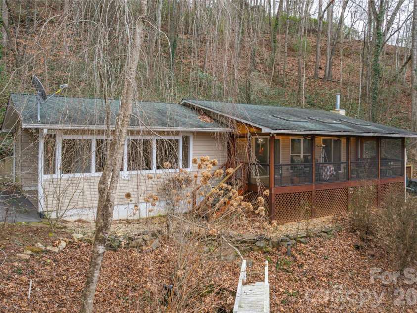 12 Bear Cove Lane, Bryson City, NC 28713.  MLS# CAR4337192, YatesRealty ID 5251. Large screened front deck