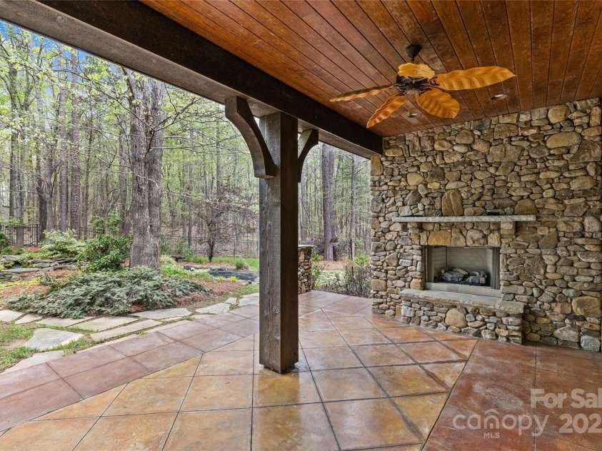 304 Ivy Springs Lane, Waxhaw, NC 28173.  MLS# CAR4239863, YatesRealty ID 5251. Covered patio off flex room